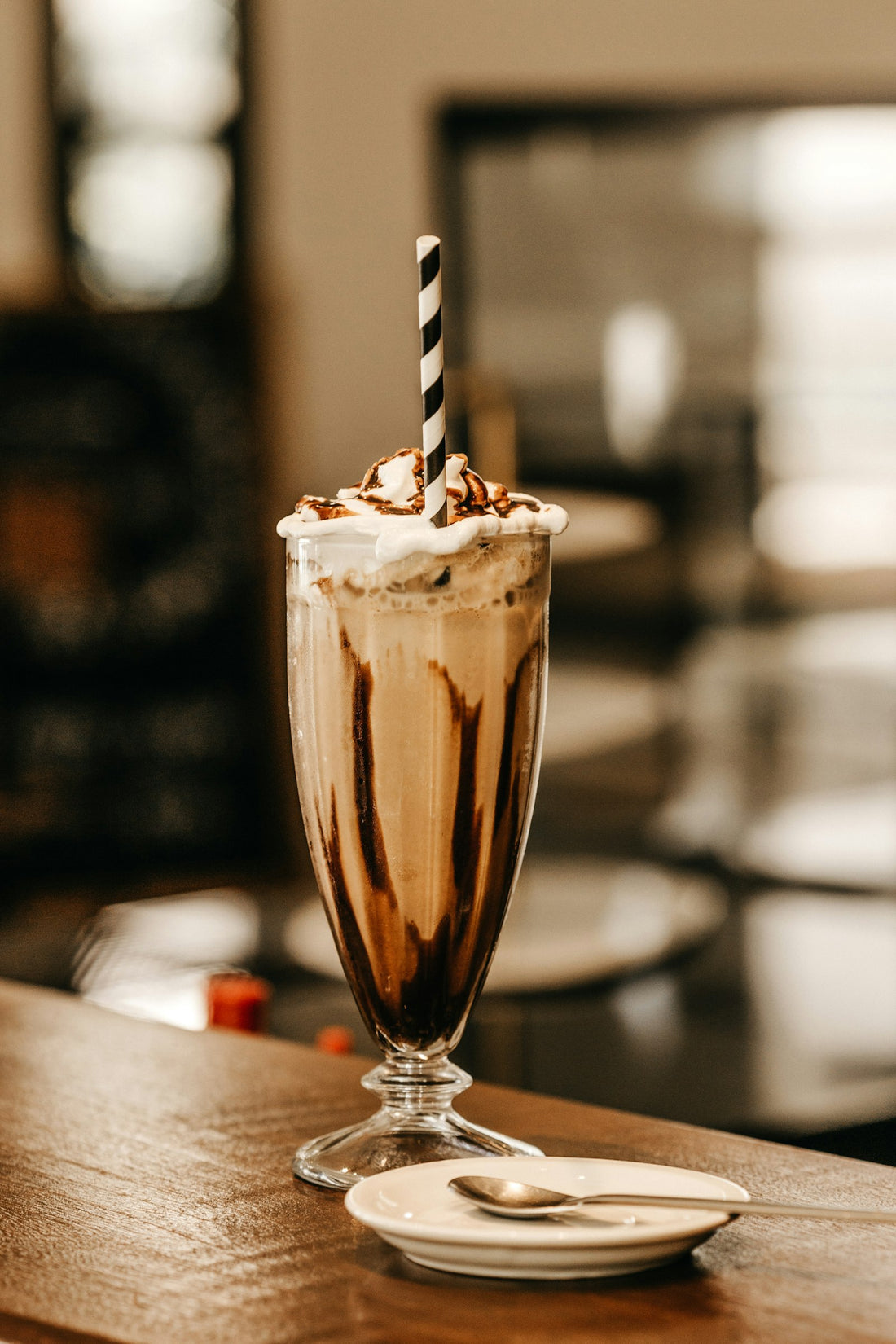 A creamy weight gainer shake in a glass