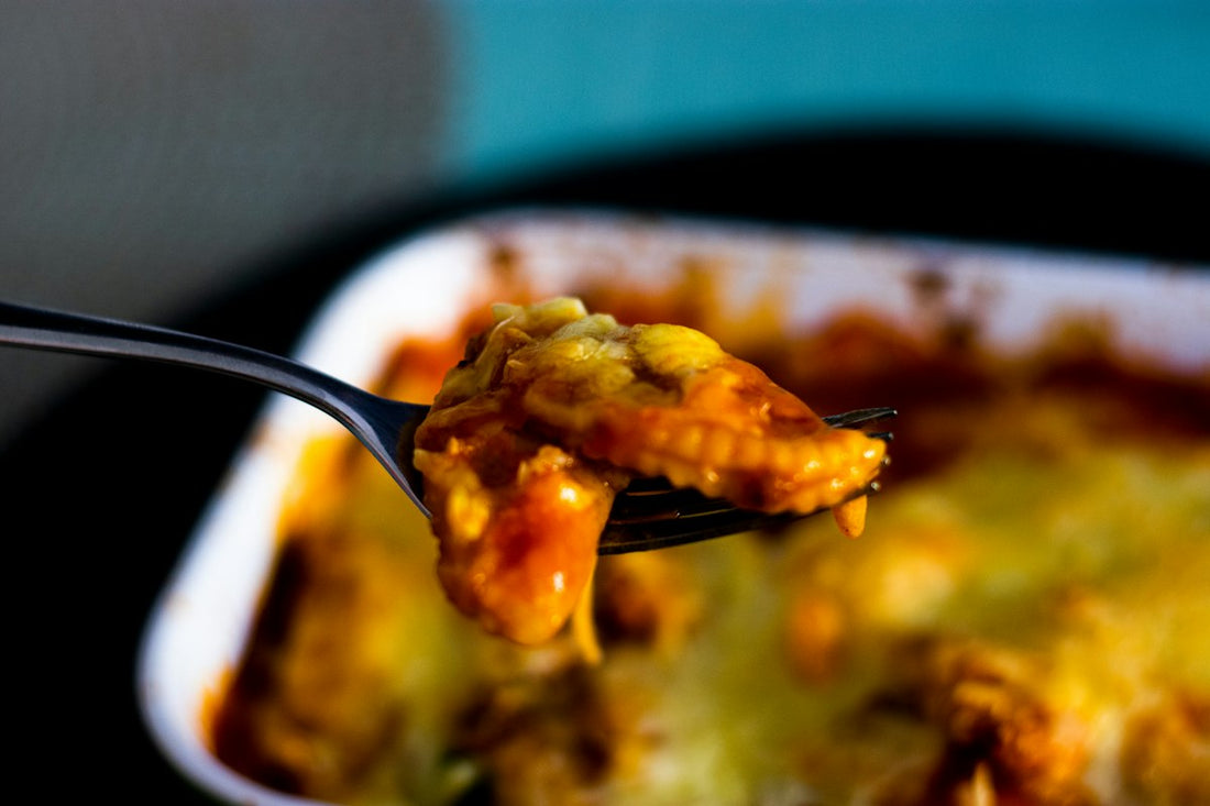 A spoonful of baked soul food casserole at a Black-owned restaurant in Atlanta