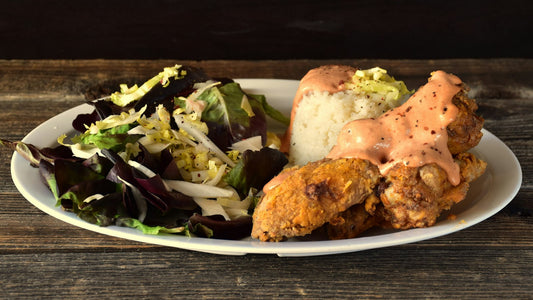 A plate of fried chicken and rice at a Black-owned restaurant in Detroit