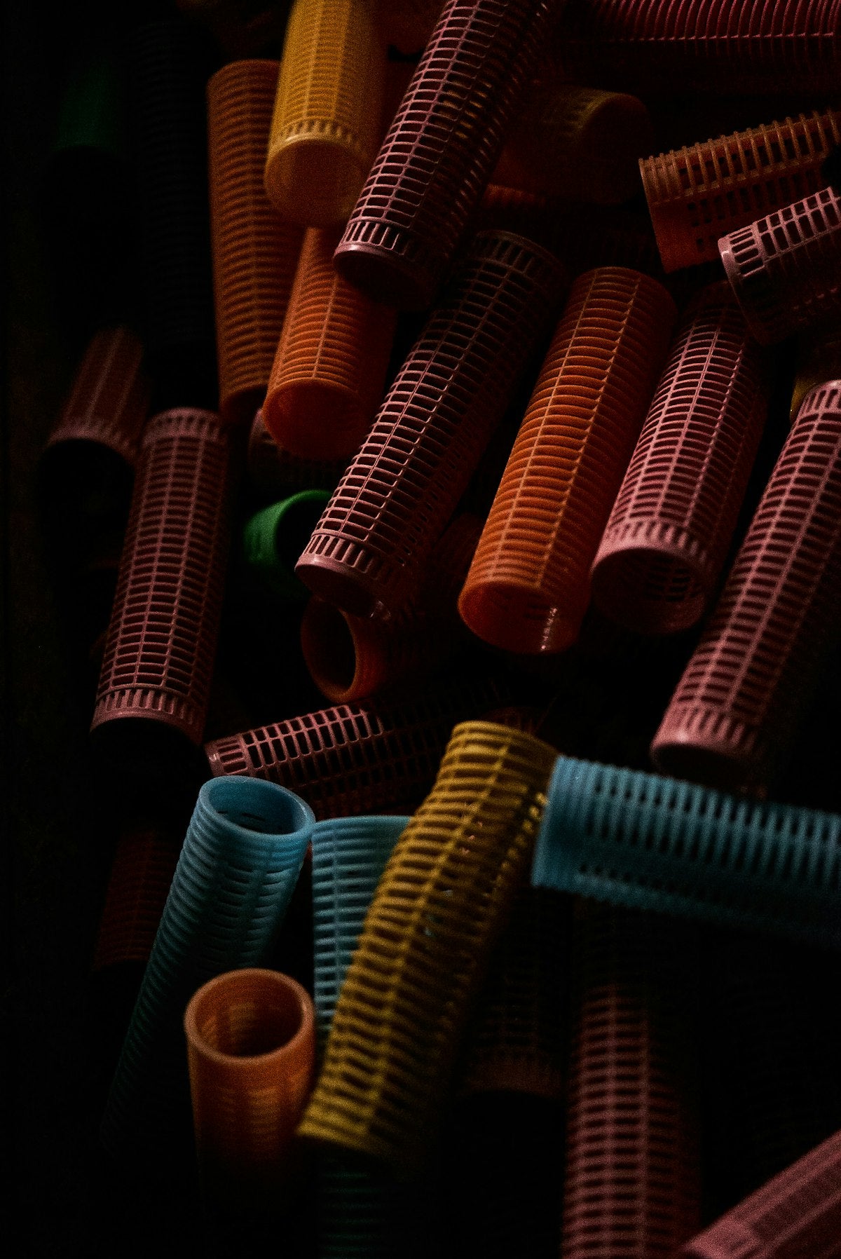 Pile of colorful hair rollers
