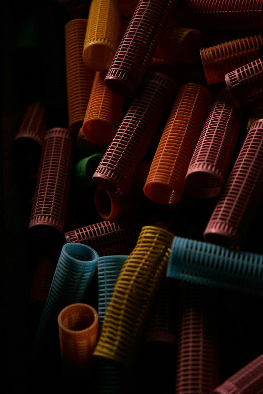 Pile of colorful hair rollers