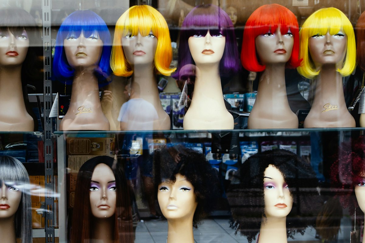Wigs on display stands